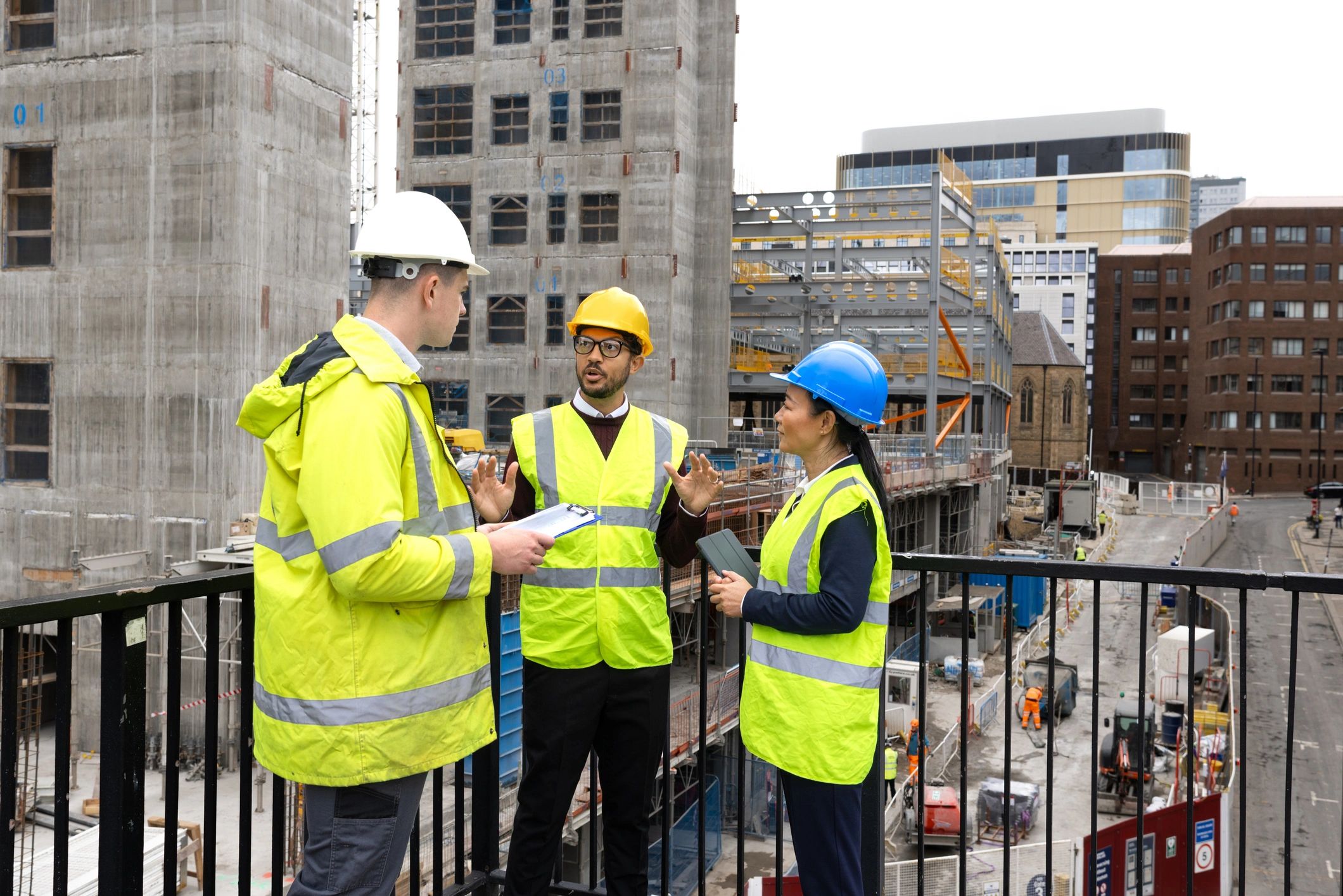 Engineering team discussing industrial project plans